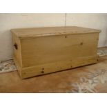 Golden pine blanket chest.