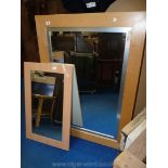 A maple finished wall mirror,