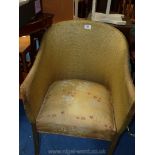A Lloyd Loom style chair.