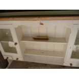 A painted cream pine dresser top, 67" long, 45" tall x 11" wide.