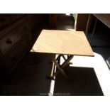 A laminated small folding table.