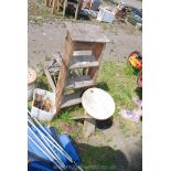 Two sets of wooden steps and a stool.