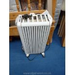 A wheeled electric radiator, Delonghi.