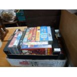 Two boxes of VHS tapes.