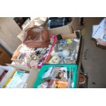 Two boxes of miscellanea including china, cutlery, bowls, bag etc.