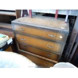 A wooden chest of drawers, four long drawers a/f.