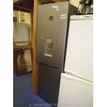 A Daewoo fridge/freezer with water dispenser.