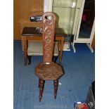 A carved Oak Spinning Chair on turned legs.