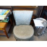 A green brocade bedroom chair.