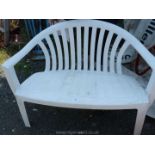 Plastic two seater bench.