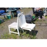 Two modern chairs and a white painted chair.