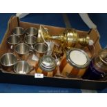 A box of stainless steel, biscuit barrel, cups, coffee grinder, two brass lamps, etc.