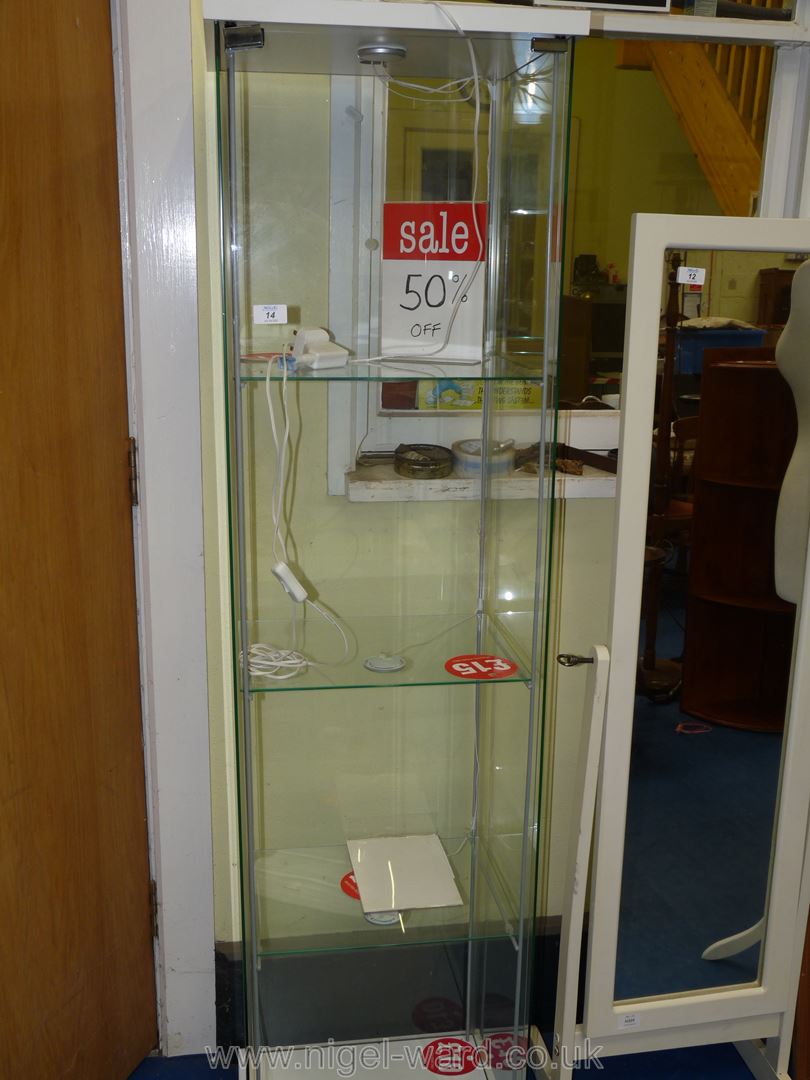 A shop display unit with four glass shelves and internal lighting.