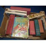 A box of vintage children's books.