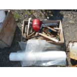 Wooden box of tools and a roll of polythene