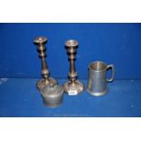 A pair of silver plated Candlesticks plus a pewter tankard and an 18th c.