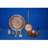 A quantity of brass and copper items to include; copper dish, two small copper pans, brass bells,