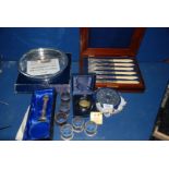A quantity of plated items including; cased set of fish knives, Readers Digest coasters,