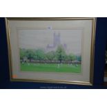 A framed Watercolour of a game of cricket on fields by a Cathedral; signed lower right M.