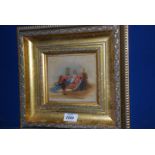 A small gilt framed Oil on board of a lady reclining on settle with a lady kneeling and a servant,