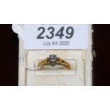 An 18 ct. Diamond Ring, size N.