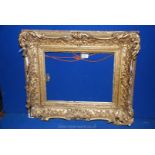 A heavy carved Victorian gilt-gesso picture Frame,