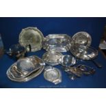 A quantity of plated tableware including serving dishes, napkin rings, bread basket etc,