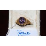 A 9ct. Gold Ring set with amethyst.