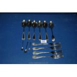 An Afghan silver part set of five dessert spoons and four forks.