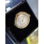 A lady's 14k gold cased crown wound brooch Watch,