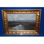 A gilt framed Oil on canvas of a moorland scene with mountains in the distance;