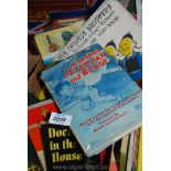 A crate of various books to include The Five Chinese Brothers, Peter Pan and Wendy by J.M.