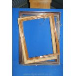 Four wooden and various size picture Frames