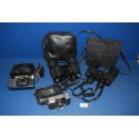 Two pairs of Binoculars including Aico 10 x 50 field 5º, Tasco 2008 10 x 50,