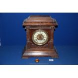 An American 'Sharon' mantle Clock with pillar columns and Roman numerals,