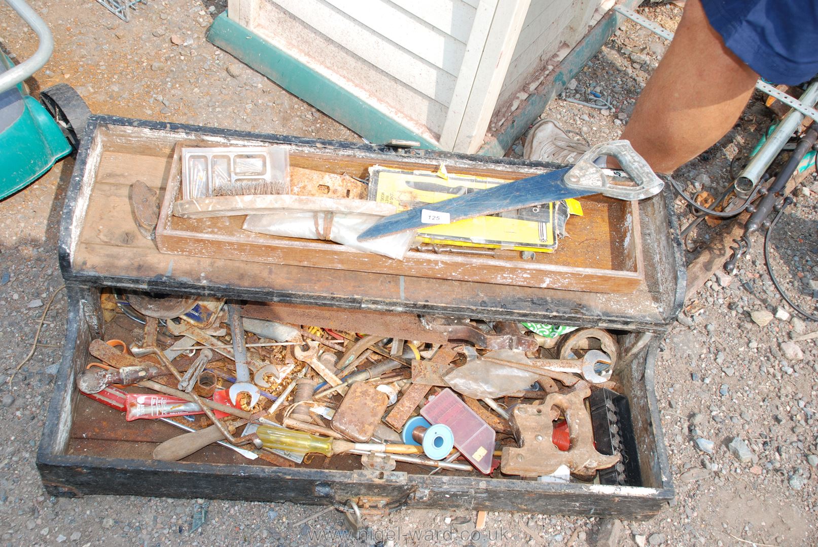 Large wooden tool box containing spanners and tools, etc.