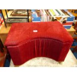 Red corduroy covered bow fronted laundry seated box.