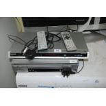 Panasonic DVD player and VHS player with remotes.