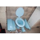 Armitage Shanks cloakroom suite to include WC and cistern, pedestal and basin in duck egg blue.