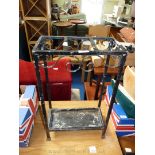 Three section wrought iron stick stand with tray,