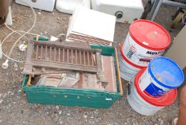3 x tubs of tile adhesive, quantity of tiles 310 mm square and a cast iron fire grate.
