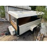 Trailer with roof.