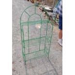 Green metal painted plant stand.