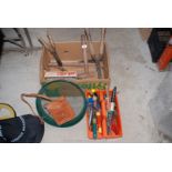 Box of gardening hand tools, battery charger and bill hook.