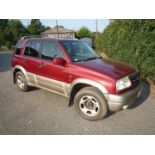 A Suzuki Grand Vitara 4 Wheel Drive 1995 cc petrol-engined 5-door motor vehicle VX03HKB in metallic