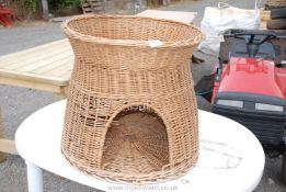 Wicker two tier cat basket.