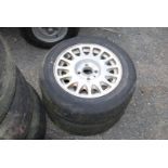 Pair of tyres on aluminium Saab rims 185/65R/15 a/f.