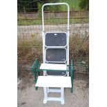 Three rung step ladder and 2 stools.