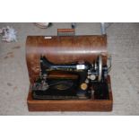 Hand Singer Sewing machine in case.