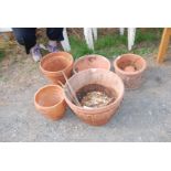 5 x large terracotta pots.